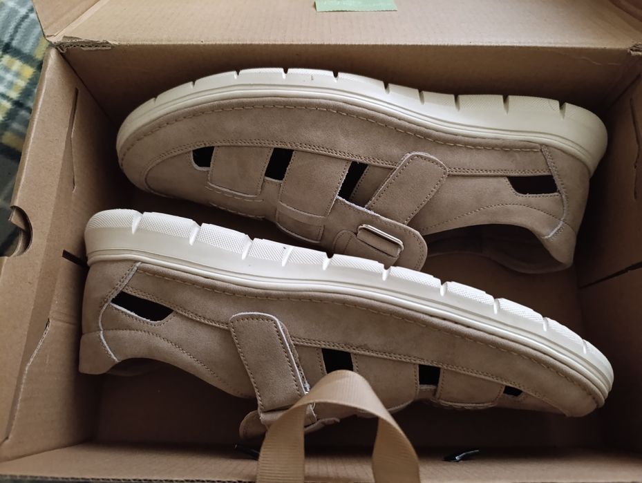 Продам новые сандалии