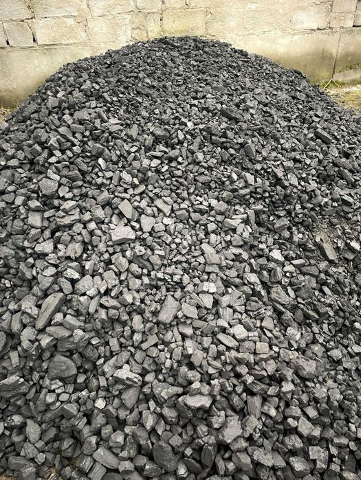 Уголь в мешках дрова