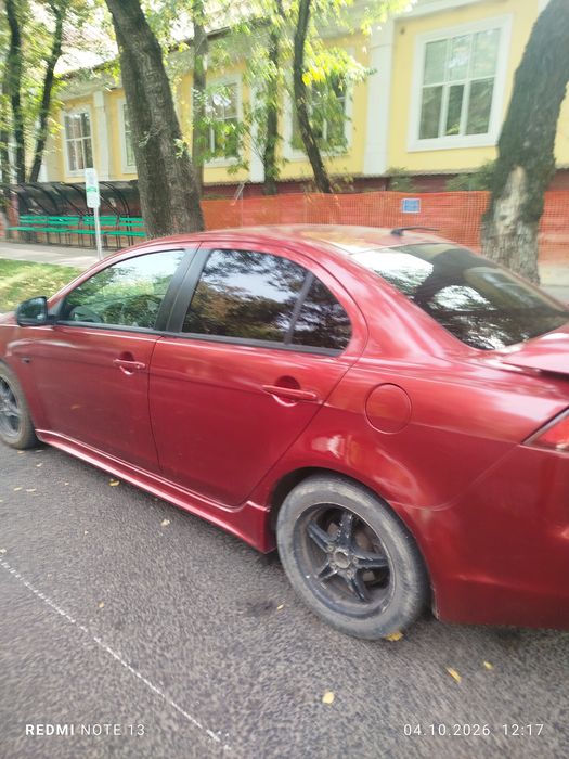 Митсубиши лансер 10