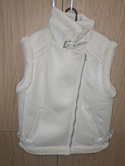 Топъл и модерен елек