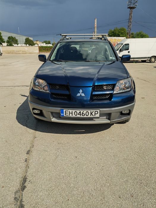 Mitsubishi outlander 2.0 136к.с Газ-бензин