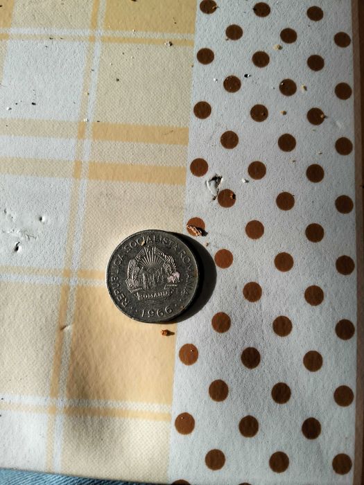Vând moneda de 1 leu