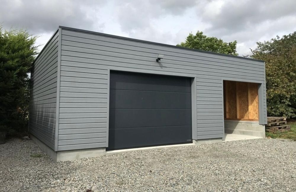 Vand garaje auto pe structura metalica învelită cu panou sendwis