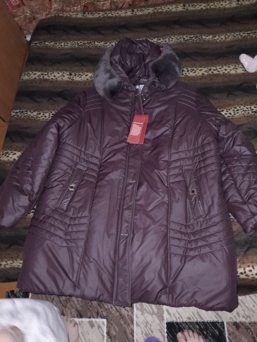 Продам пуховик размер 68-70