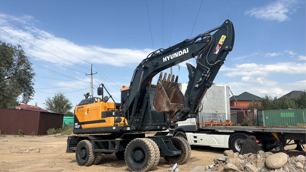 Аренда колесного эксковатора HYUNDAI 145+