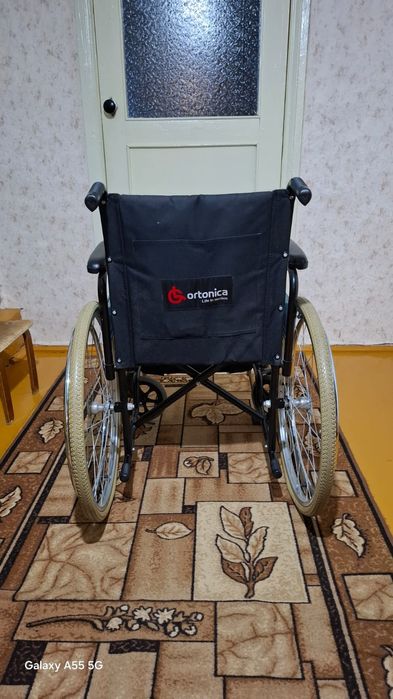 Инвалидная коляска