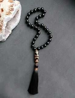 Браслеты с талисманами Дзи