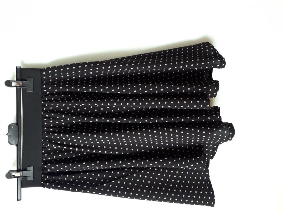 fusta clos , asimetrica