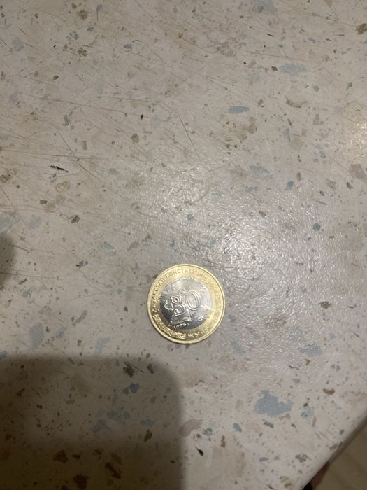 100тенге не обичный 30лет колекция