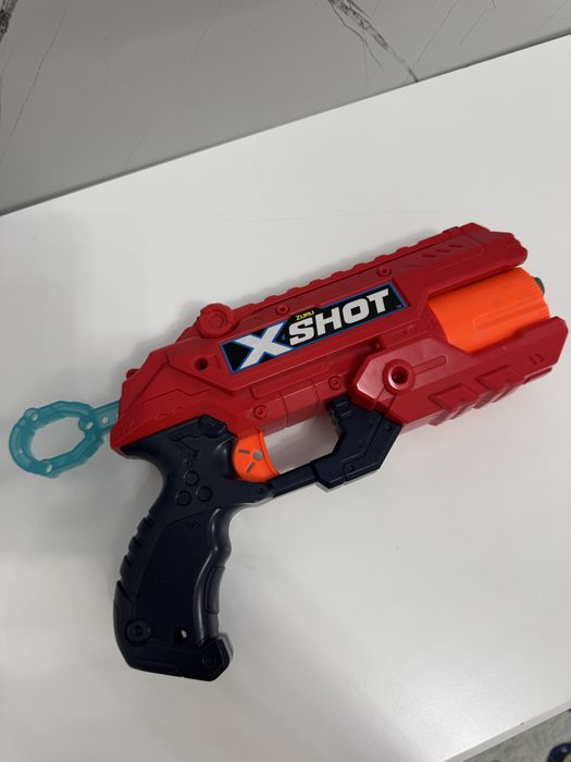 Игрушка пистолет