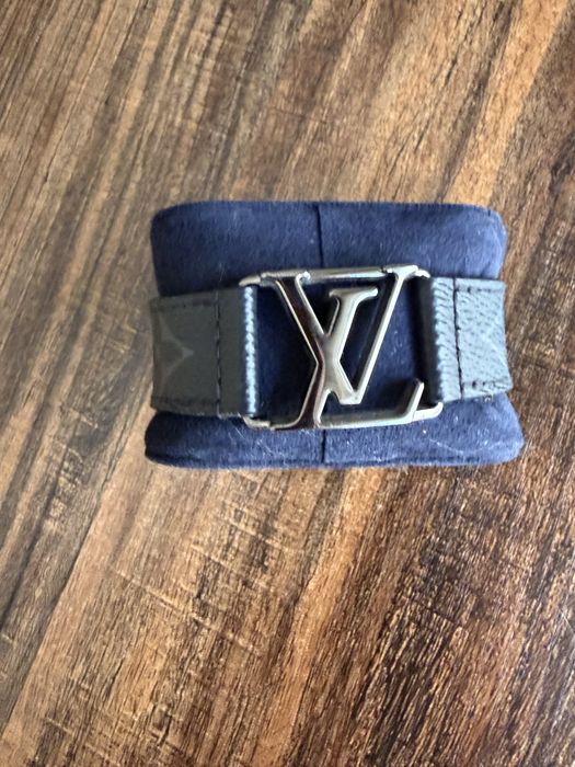 Louis Vuitton LV Initials bracelet, black leather with silver-tone hardware.