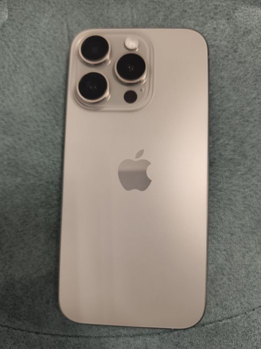 iPhone 15 pro natural titanium 128gb
