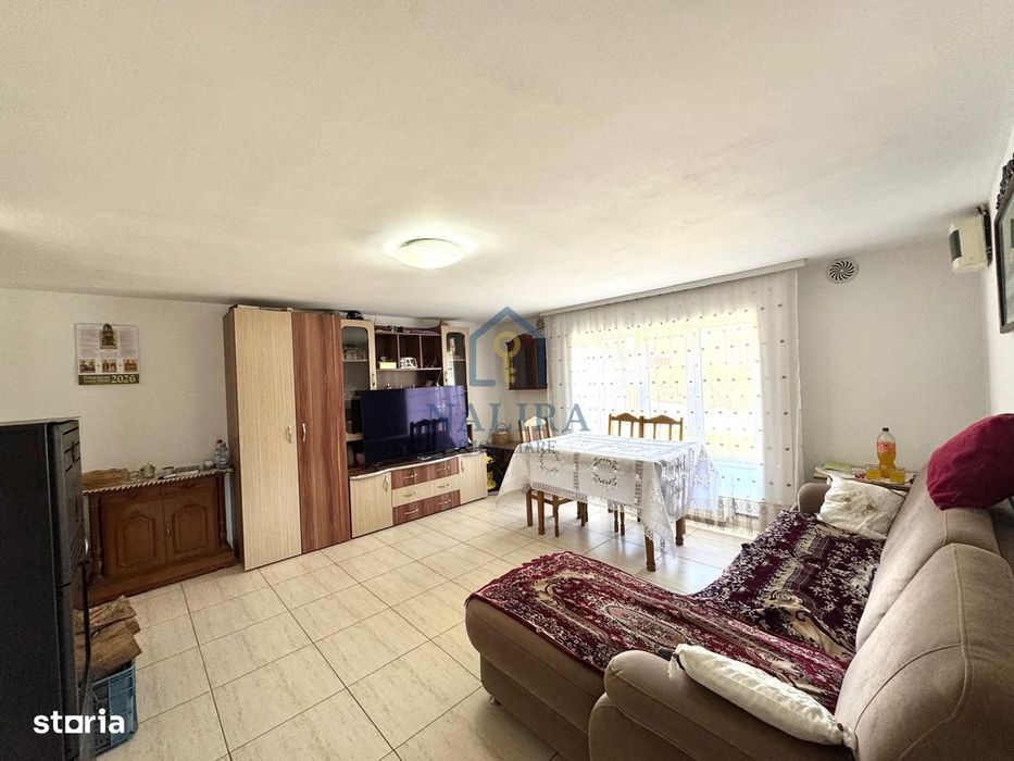 Casa de caramida de vanzare Surdesti cu teren intravilan 5000mp
