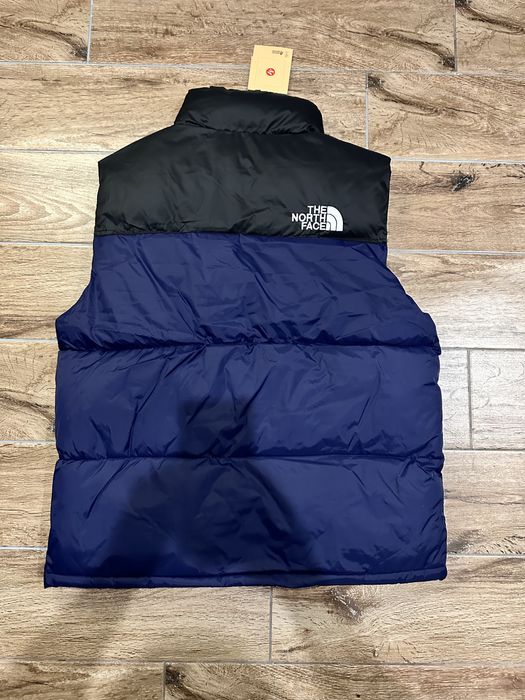 The North Face жилетка пух