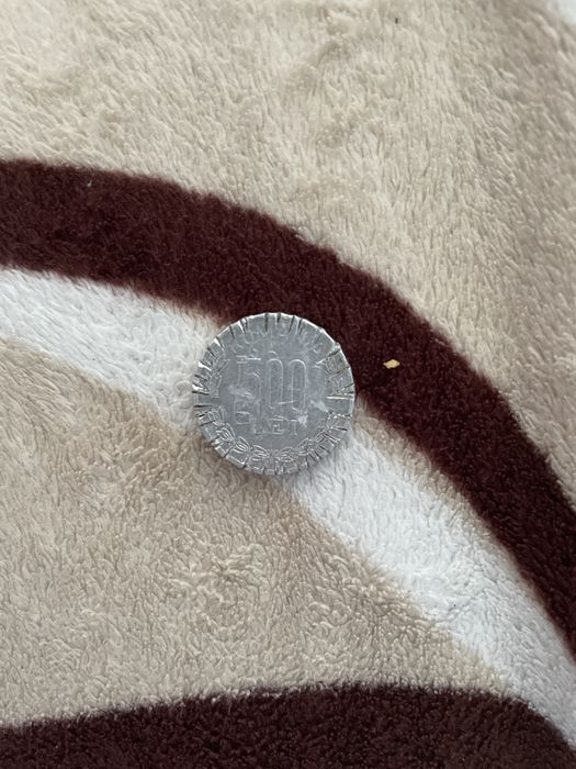 Moneda din anul 1000 cu stema Romaniei