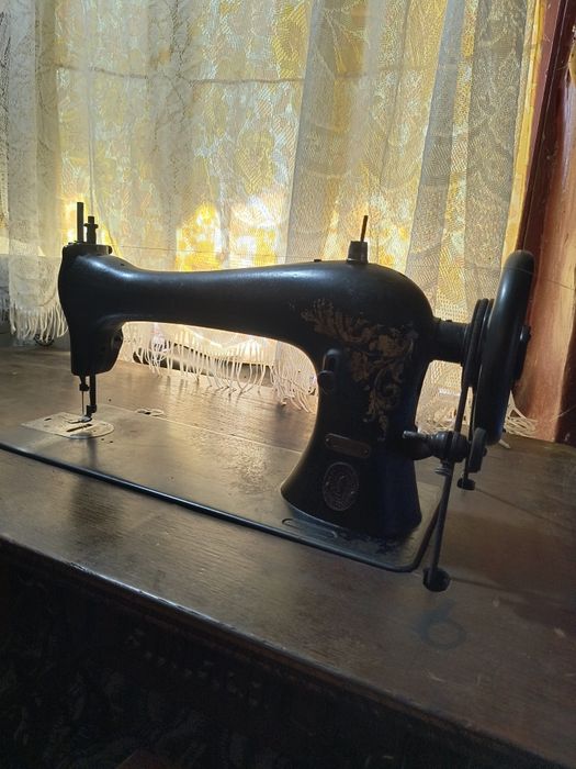 Mașină de cusut Singer