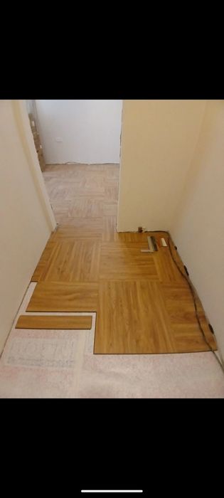 Укладка ламината , линолеума, кварцвенила.