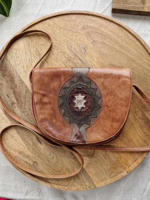 Кожени чанти и портмоне нови и използвани