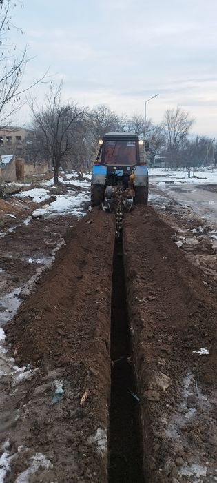 Услуги траншеекопател