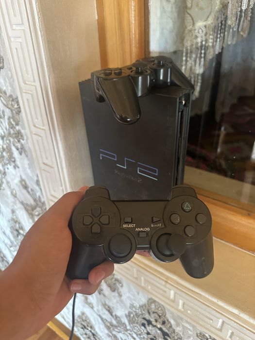 Playstation2 holati yaxshi ichida uyini yoq