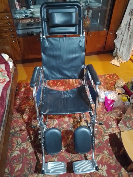 Инвалидная коляска.