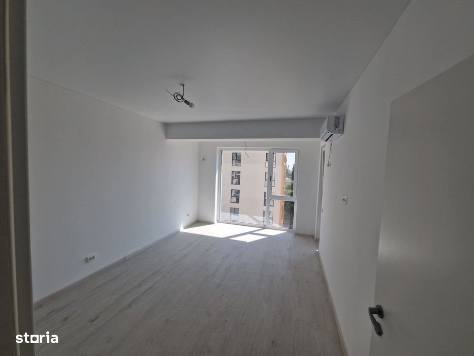 Apollo Garsonieră modernă cu balcon — fotografia 1