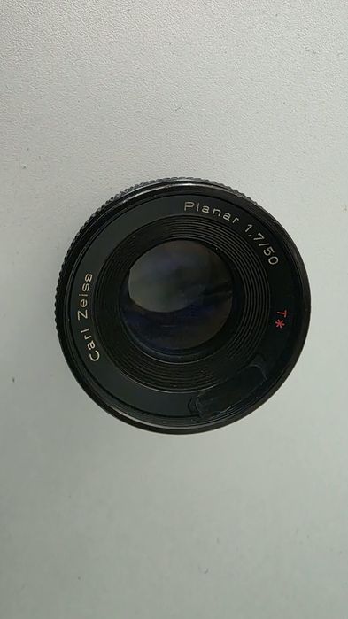 Obiectiv foto  Carl Zeiss Planar 1,7/50 functional, urme normale de folosinta