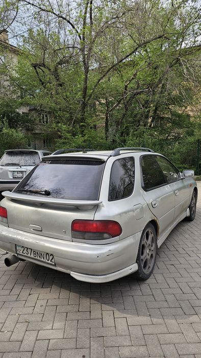 Subaru Impreza WRX 2 литра, моно турбо.