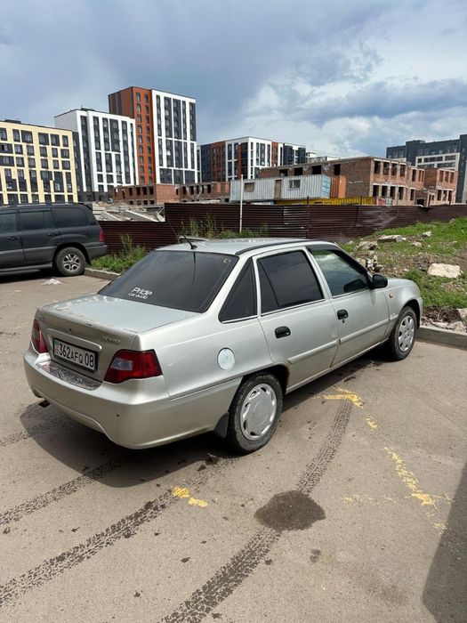 Daewoo Nexia серебристый