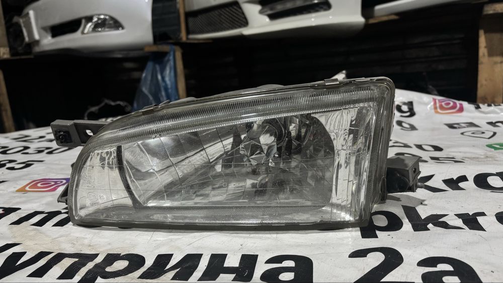 Фара галоген Subaru Impreza левая сторона