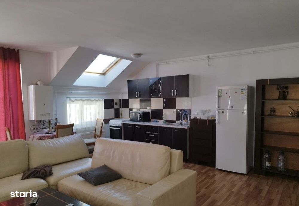 Apartament modern, două balcoane,parcare, living cu bucătărie,dormitor