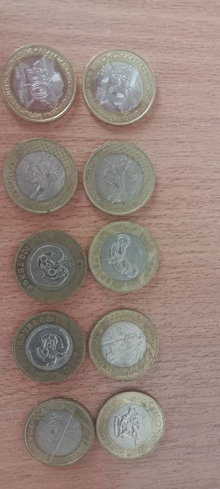 Монеты теңге 100