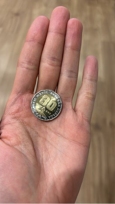 Продам монету 80 лет подебы.