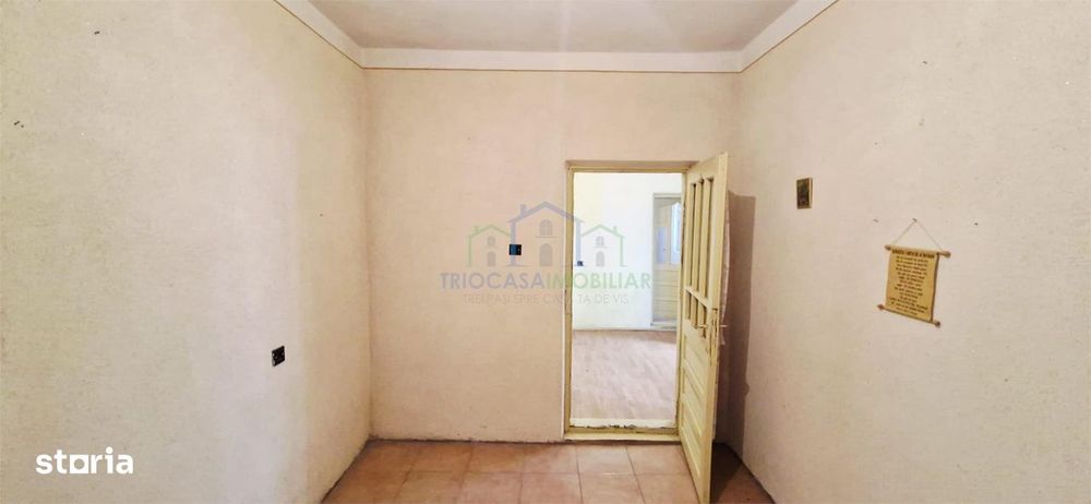 Casa Bradesti , teren  intravilan 7952 mp , deschidere 33 m la DE 70