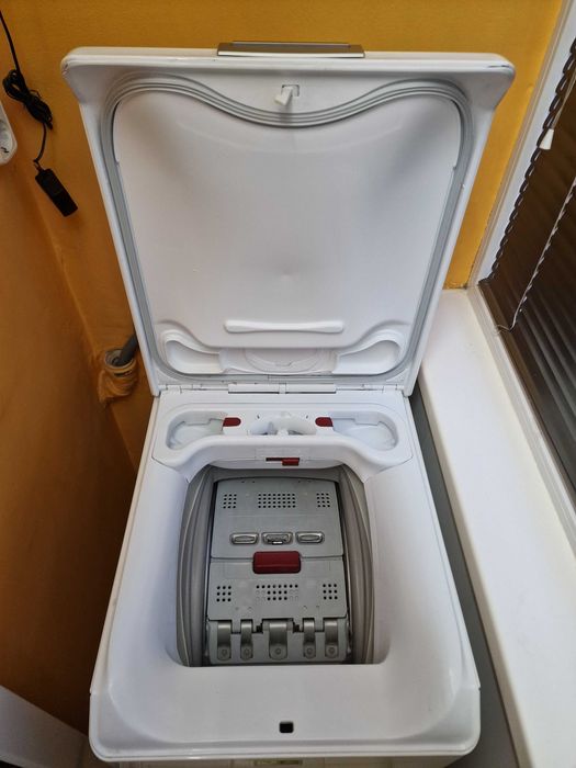 Пералня AEG с горно отваряне