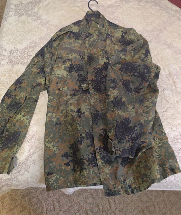 Камуфлажни дрехи