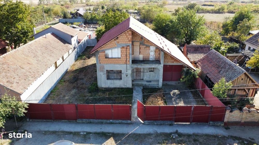 Casa individuala la rosu, intabulata - Uliuc - Sacosu Turcesc