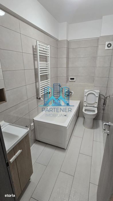 Apartament 1 camera + loc de parcare mobilat+utilat Bucium-Visan,liber