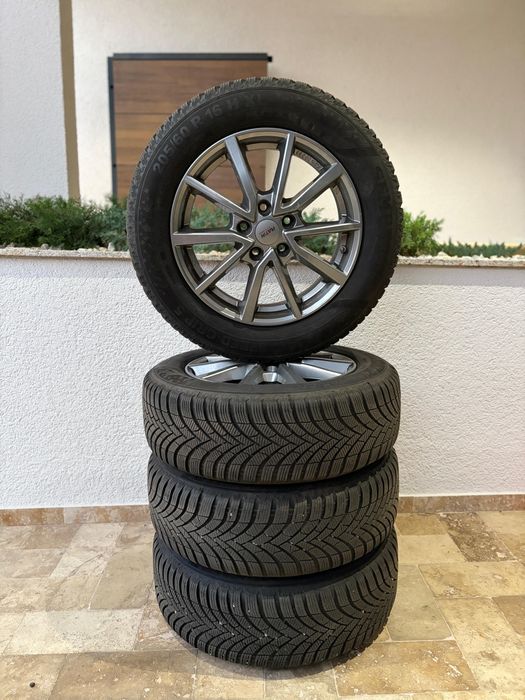 Set 4 jante aluminiu 5x108 Platin Ford Focus 3 4 R16 cu anvelope de iarna