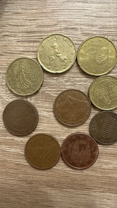 Монеты евроценты и американские центы