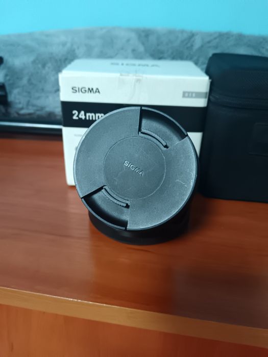 Продавам обектив Sigma 24mm f1.4 DG HSM Art за Никон