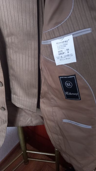 Продам новый костюм