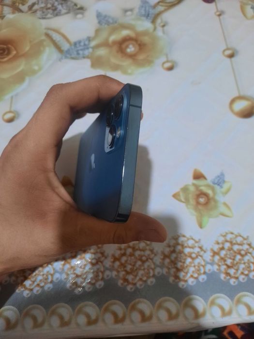 Iphone 12 pro max  hamma joyi radnoy tiniq tel  kamera juda tiniq