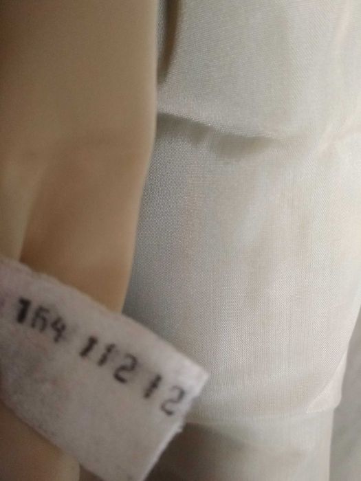 Женская одежда. Плащ