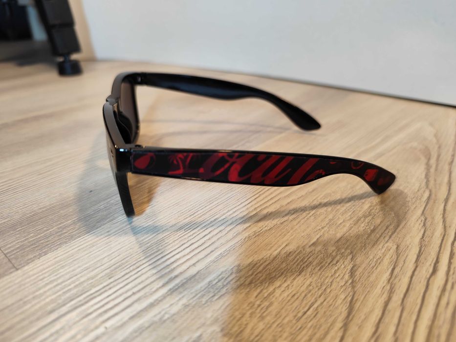 Ochelari Coca Cola cu efect 3D doua imagini pe rame