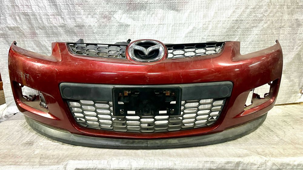 Бампер передний на Mazda CX-7 дорест 2006-09 год. Оригинал из Японии.