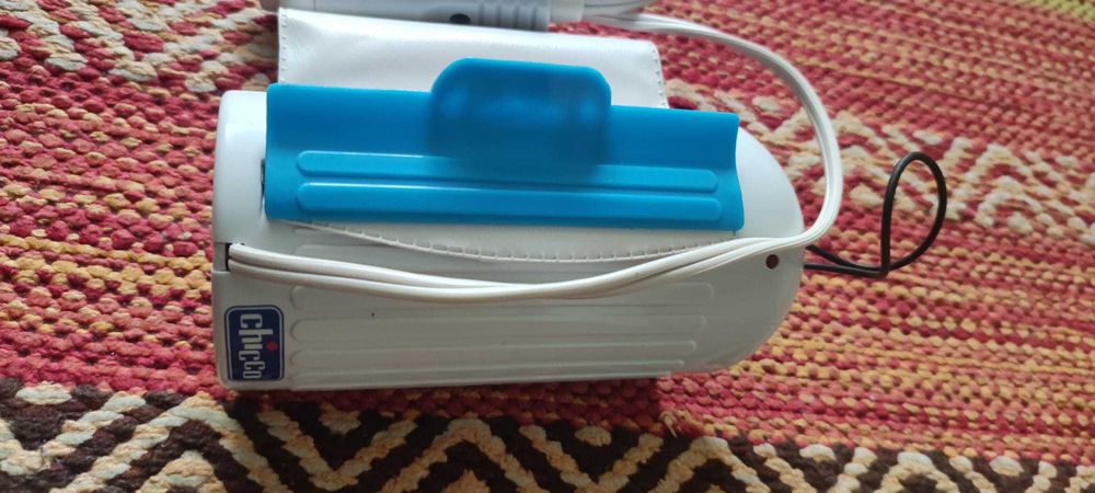 Vand incalzitor auto pentru biberoane CHICCO