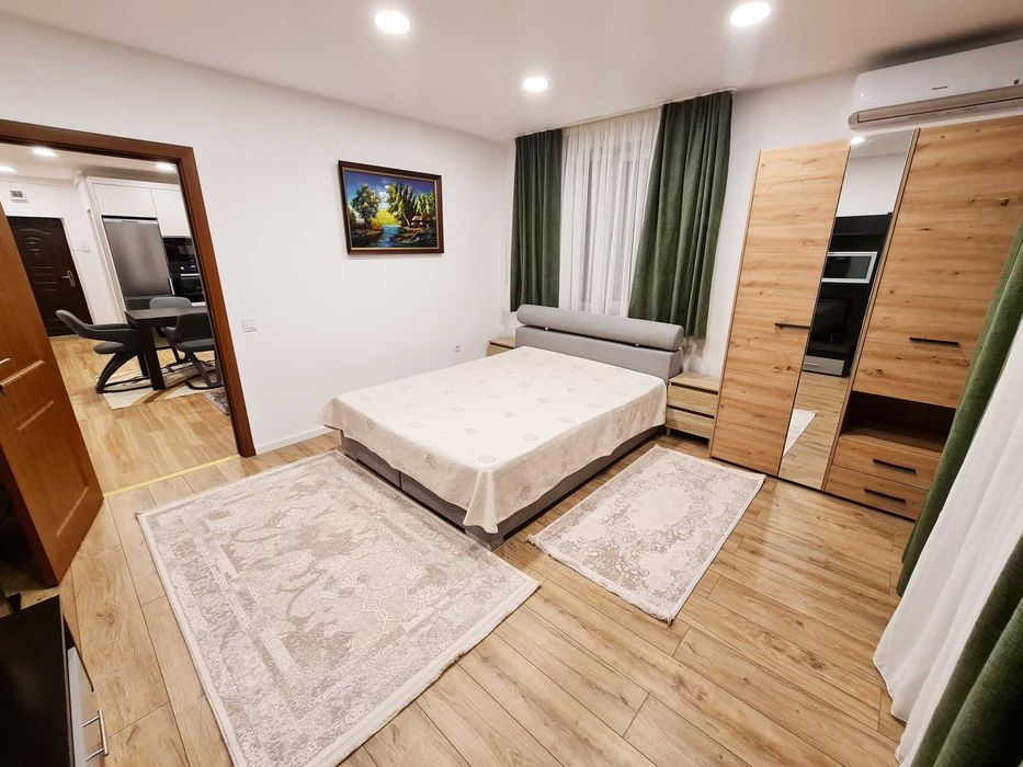 Inchiriez apartament 90mp Eliade 4 camere 2 bai garaj mobilat utilat