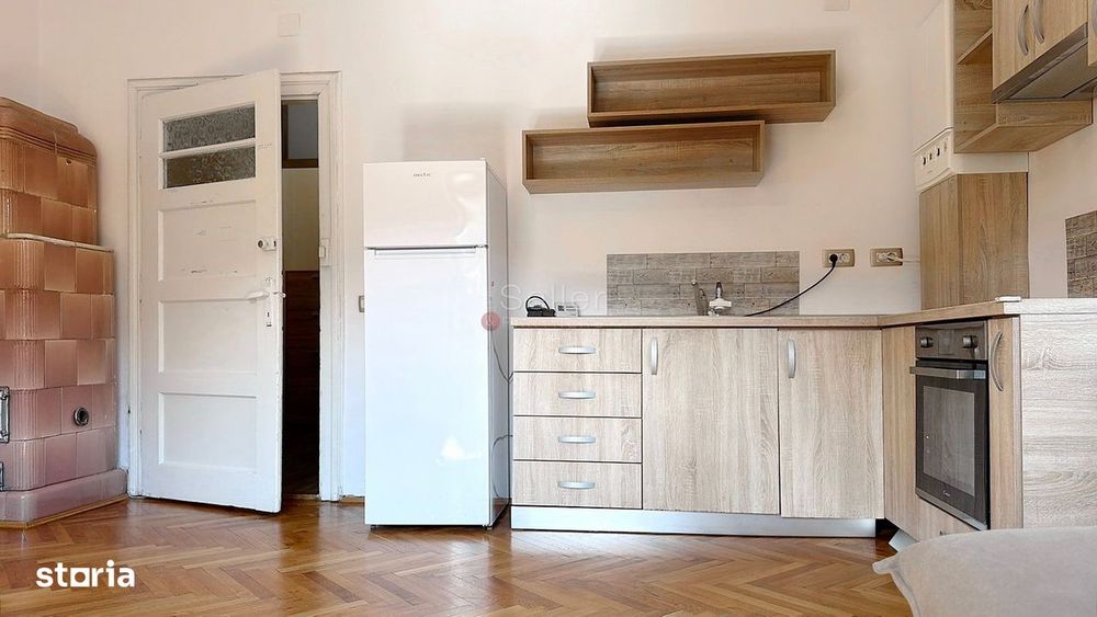 Apartament cu Acces la Curte Garaj Inclus