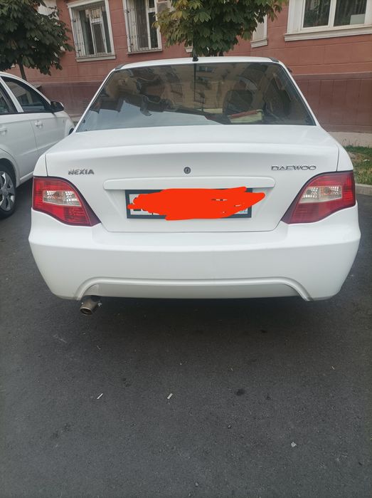 Nixia 2.3     2009 rangi oq gaz benzin